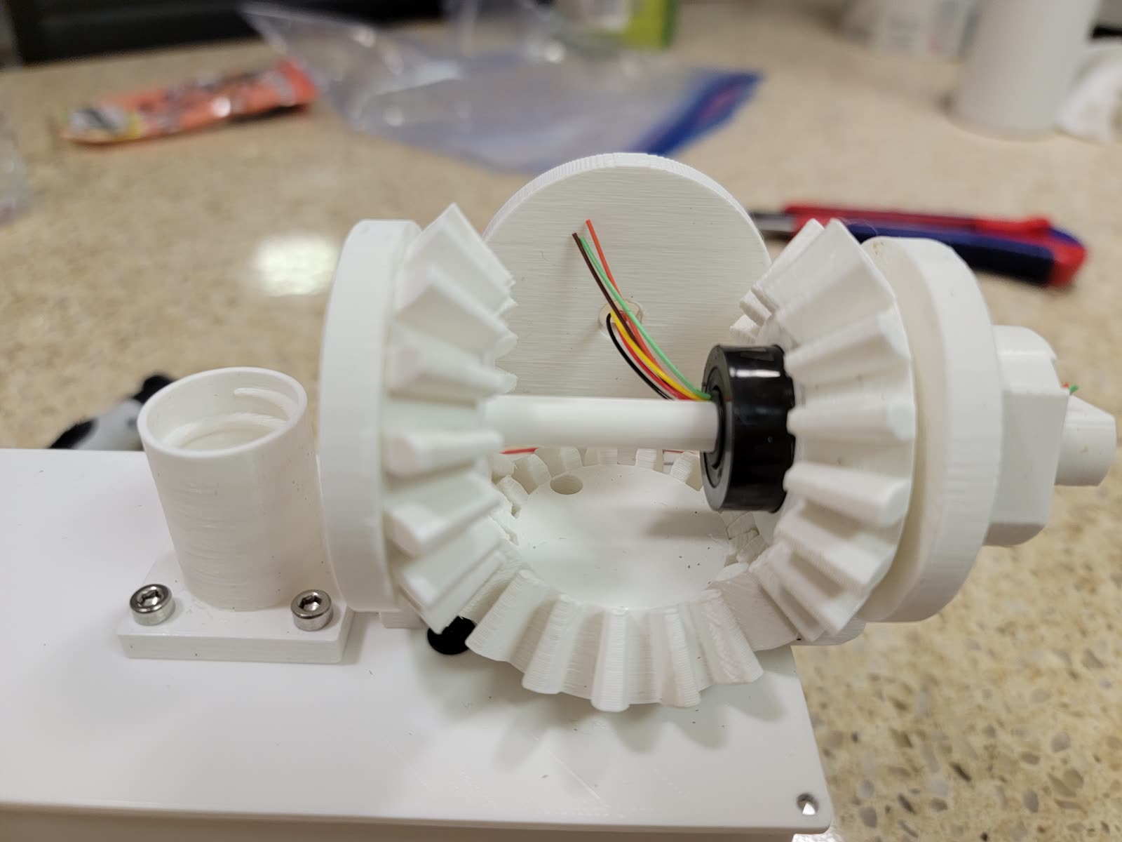 The printed bevel gear drivetrain on the bench