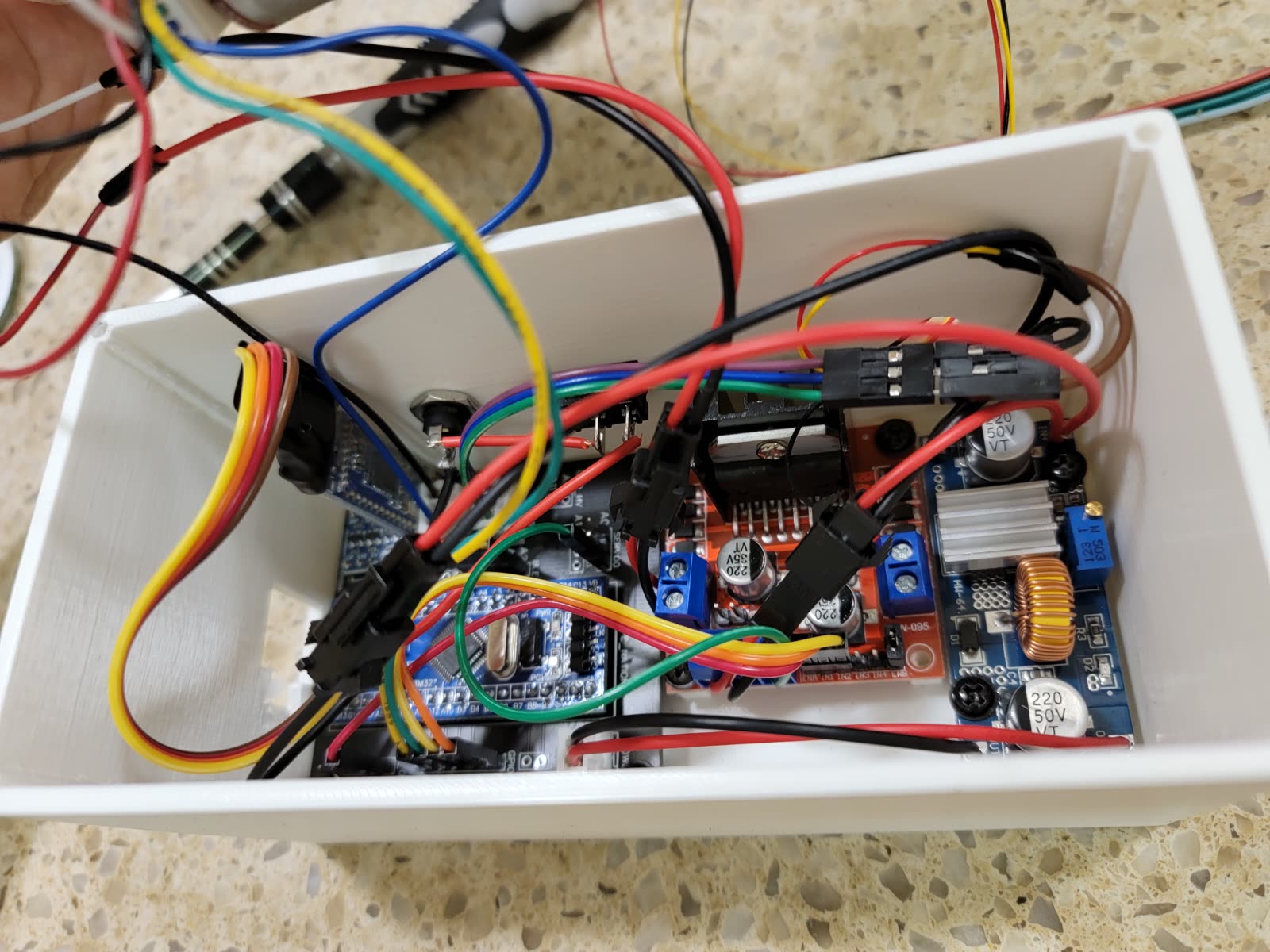 Wired electronics bay with motor driver and buck converter