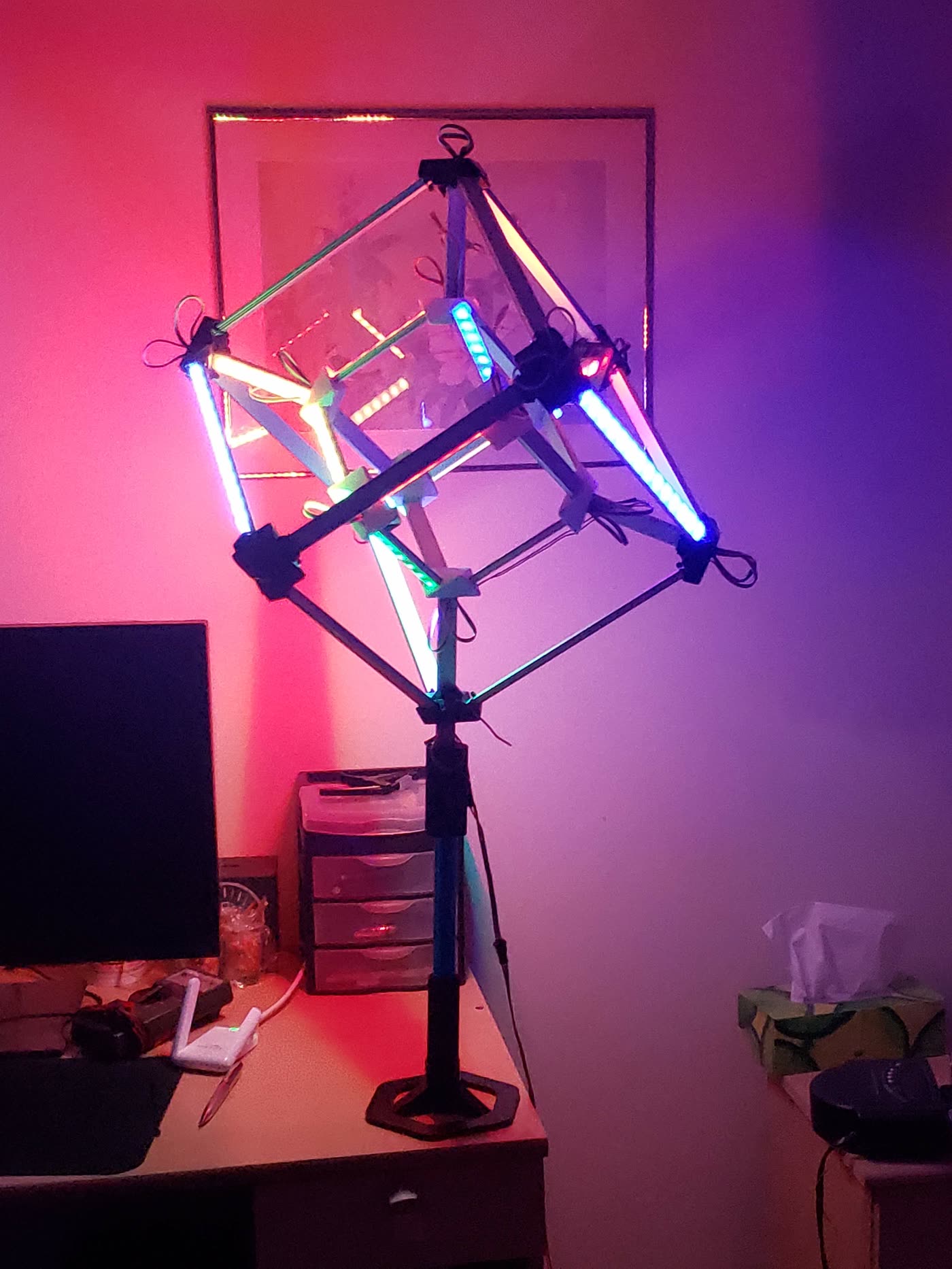 The finished tesseract, lit up on its stand