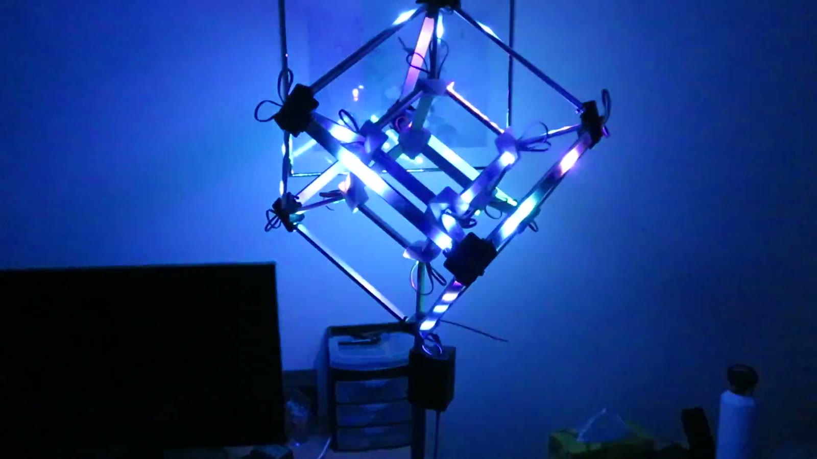 The tesseract lit with different colours on different edges
